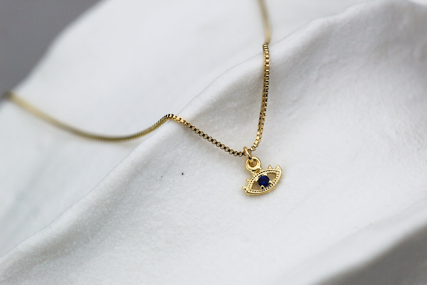Collar Ojo Luz azul