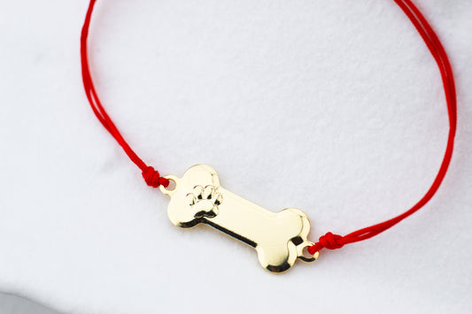 Pulsera Huesito Patita Rojo, un símbolo para amantes de los animales