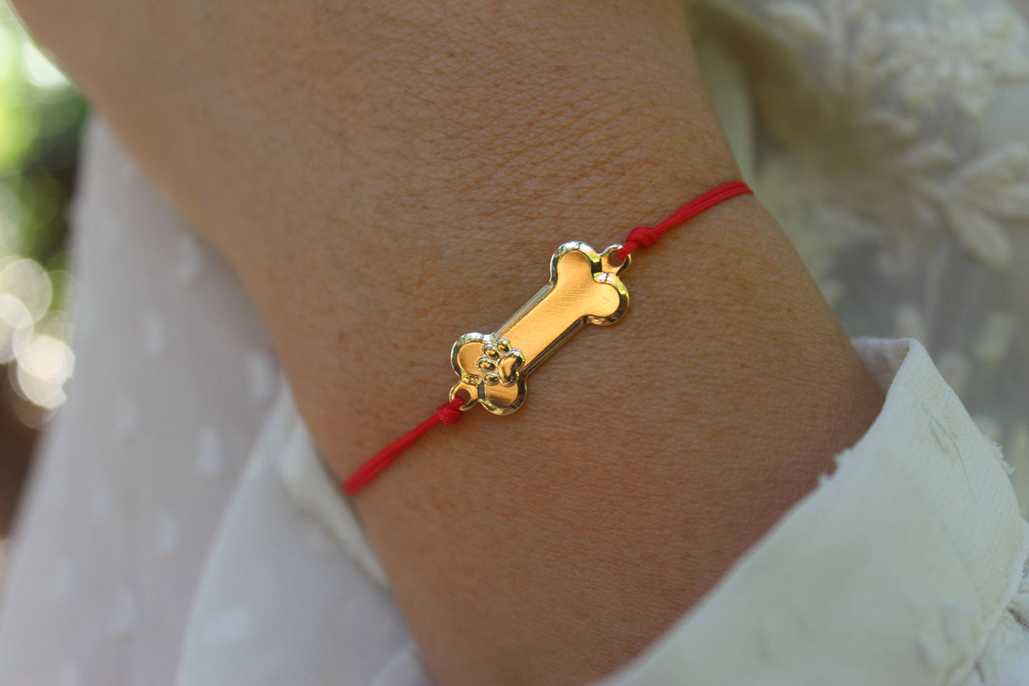 Pulsera Huesito Patita Rojo, un símbolo para amantes de los animales