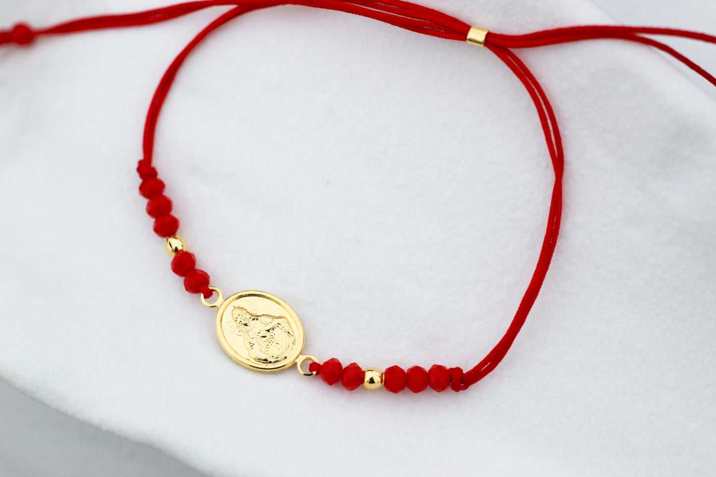 Pulsera Jesús Rojo C, fe que te acompaña cada día