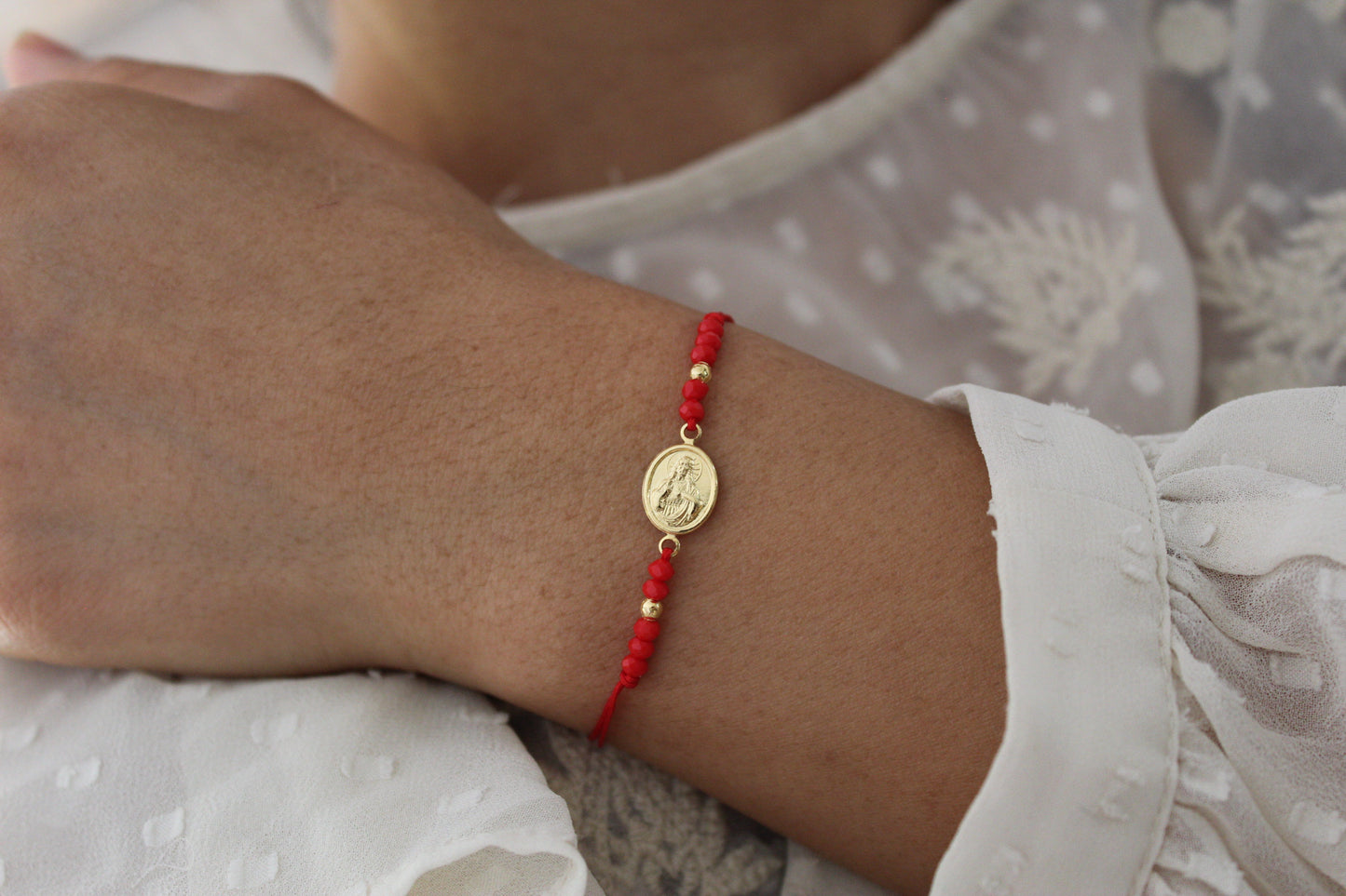 Pulsera Jesús Rojo C, fe que te acompaña cada día