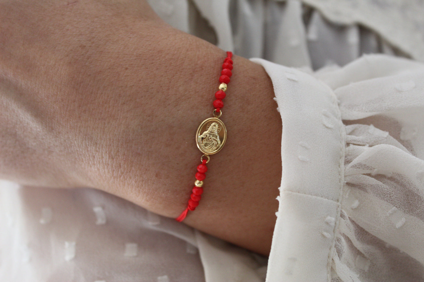 Pulsera Jesús Rojo C, fe que te acompaña cada día