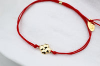 Pulsera Suerte Vol Rojo, un pequeño amuleto para atraer lo bueno 1