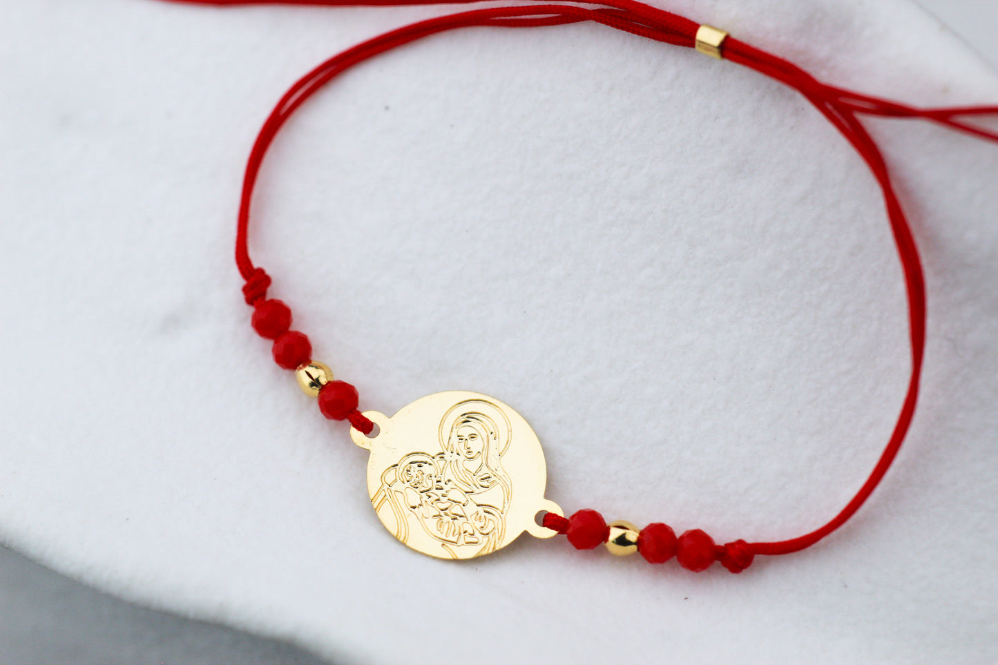 Pulsera Virgen de la Leche Rojo C, un símbolo de amor maternal y esperanza