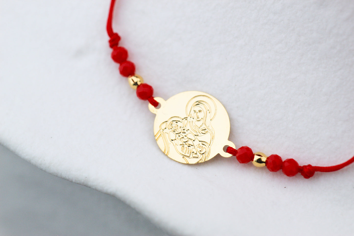Pulsera Virgen de la Leche Rojo C, un símbolo de amor maternal y esperanza